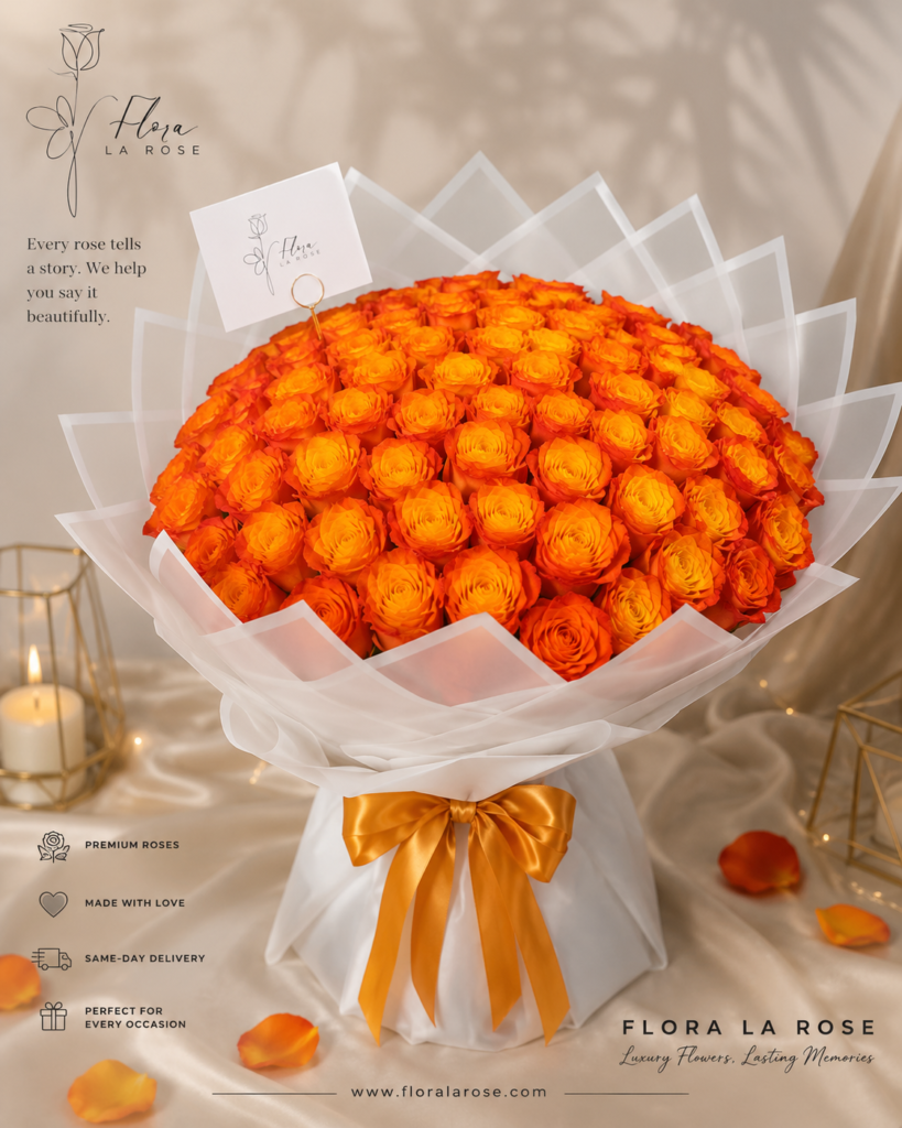 Luxury orange rose bouquet with golden ribbon and white wrapping by Flora La Rose in Dubai